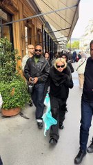 Singer Madonna strolls through Paris with her boyfriend.