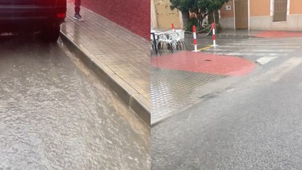 Floodwater gushes down Alicante street