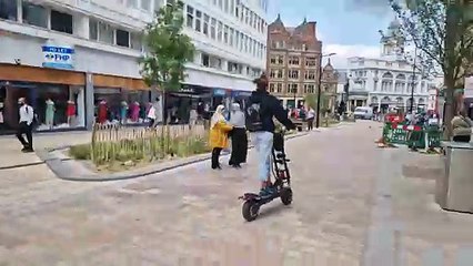 E-scooter and e-bike on Fargate, Sheffield