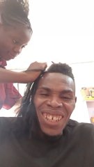 Plaiting my hair with this beautiful young lady in a rush for the first time