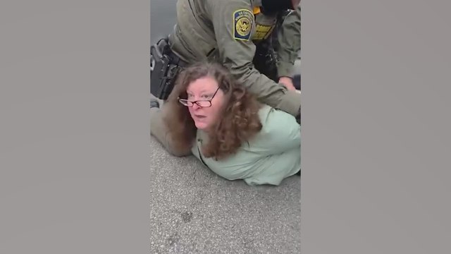 Masked Border Patrol Agents Aggressively Arrest WGN-TV Producer for obstructing justice.