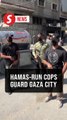 Hamas-run police officers stand guard in streets of Gaza
