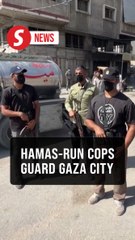 Hamas-run police officers stand guard in streets of Gaza