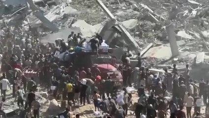 Palestinians surround Gaza aid truck in desperate bid to gather supplies