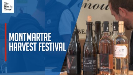 Tourists flock to the Montmartre Harvest Festival in Paris