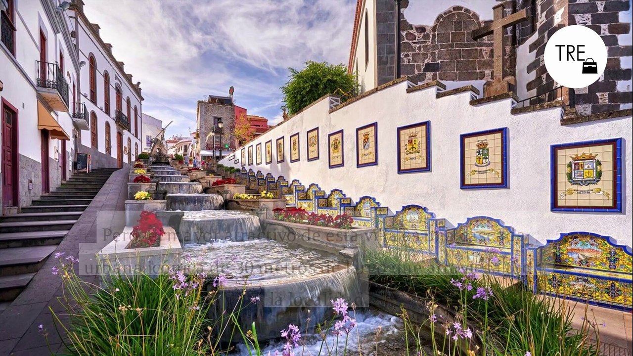 Cascadas urbanas, casas tradicionales y un molino del siglo XVI: así es el pueblo español más bonito del otoño