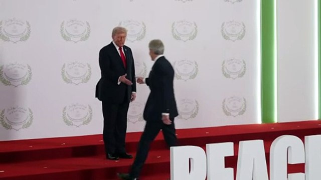 Tony Blair and Donald Trump shake hands at Gaza peace summit