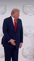Trump Greets President Macron With Long Handshake