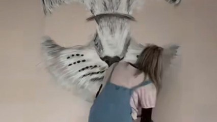 Stunning mural of a cat with mirrored glasses adds unique charm to a modern lounge wall