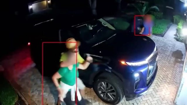 Couple ambushed by armed robbers who tracked them to their home after planting an AirTag on their car