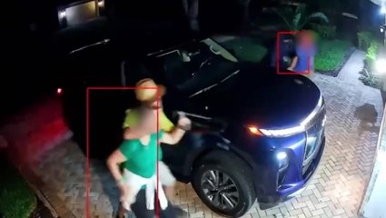 Couple ambushed by armed robbers who tracked them to their home after planting an AirTag on their car