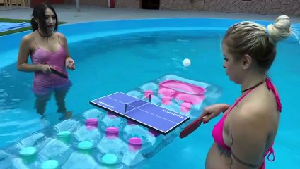 Swimming Table Tennis in the pool