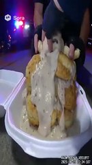 A pile of biscuits and gravy getting arrested