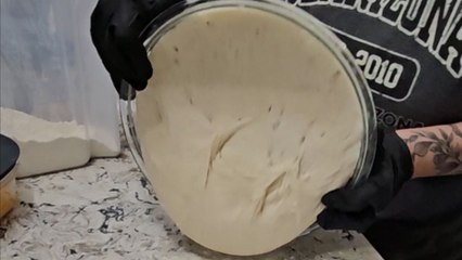 Baking goes wrong: Over-fermented sourdough dough clings inside the bowl