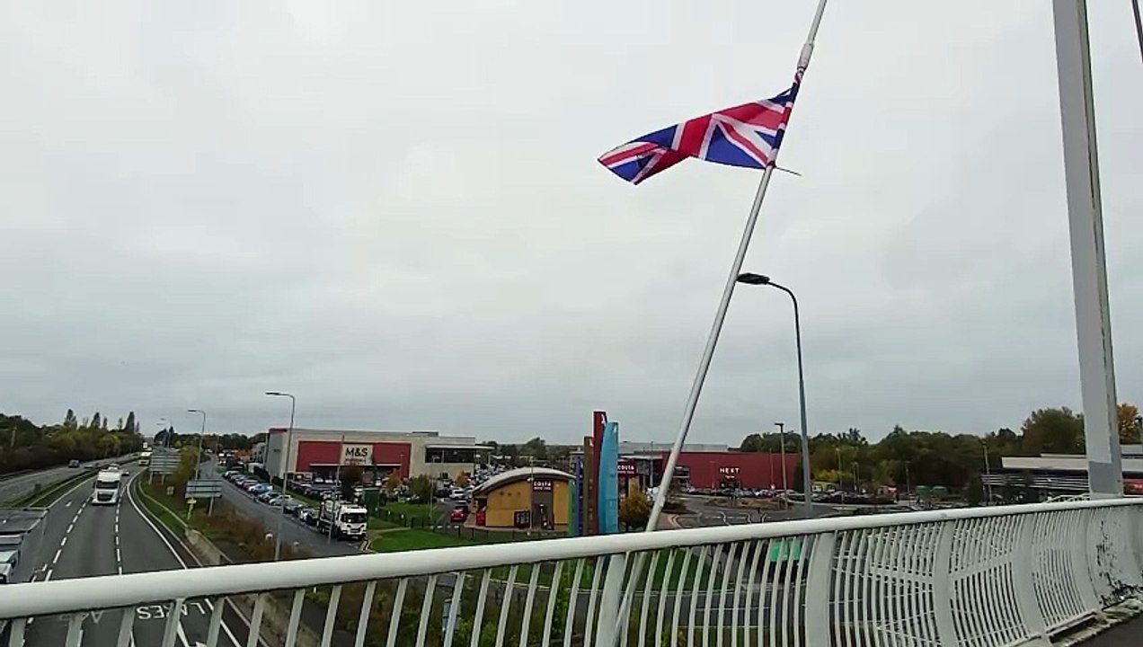 National Highways say flags 'a danger to motorists' as Union Jack attached to bridge over Rushden Lakes