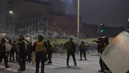 Tear gas deployed as police and young protesters clash in Peru’s capital