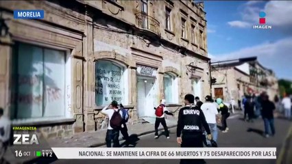 Normalistas de Morelia vandalizan comercios y autos durante manifestación
