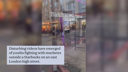 Shocking moment young boys with machetes brawl on busy high street in east London