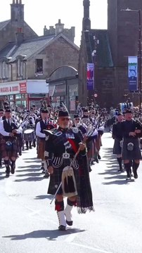 Massed Pipes and Drums lead Chieftains parade to the Crieff Highland Gathering in Scotland 🏴