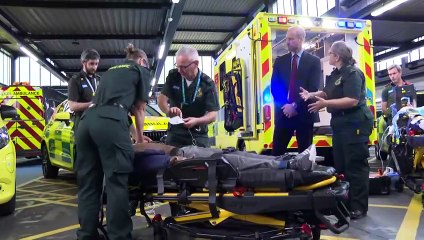 William watches CPR demonstration during ambulance HQ visit
