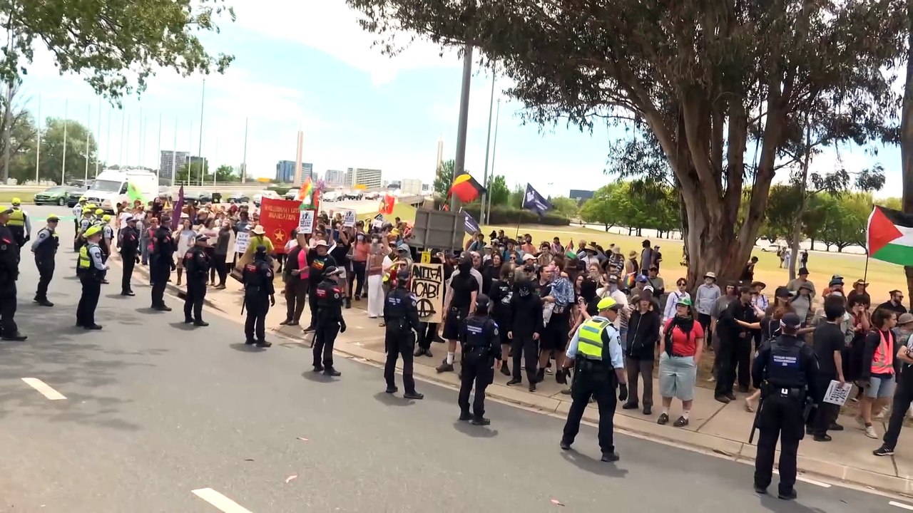 Anti-migration protestors and counter demonstrators clash in Canberra and across Australia