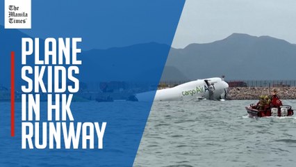 Cargo plane slides off runway in Hong Kong, media reports two dead