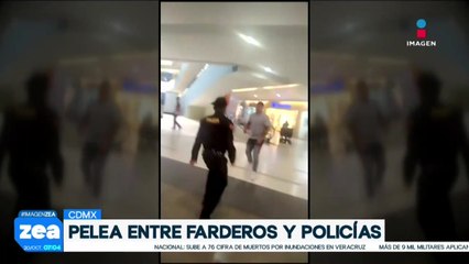 Se registra pelea entre farderos y policías dentro de una plaza del Centro Histórico