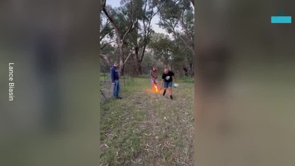 Flaming Golf Ball Shot Sets Bonfire Ablaze