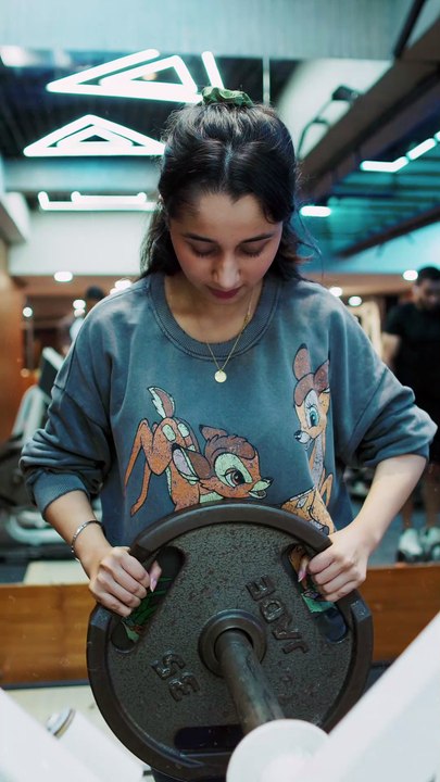 Girl Doing Squats Workout at Bodyzone | Elite Gym in Chandigarh | World-Class Fitness Machines