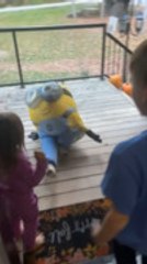Little Girl Playfully Knocks Down Brother After Seeing Him in Costume