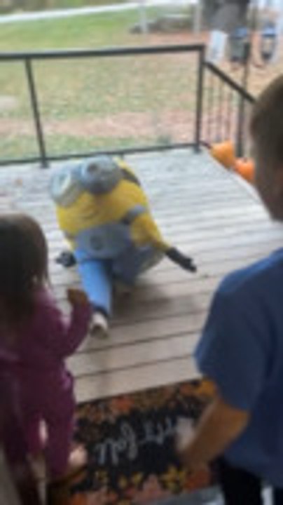Little Girl Playfully Knocks Down Brother After Seeing Him in Costume