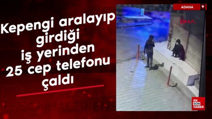 Adana'da kepengi aralayıp girdiği iş yerinden 25 cep telefonu çaldı