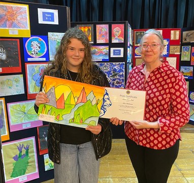 Winners of the Alton Art Society's Children's Competition 2025 receive their prizes