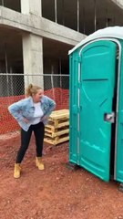 Lady knocks over porter potty person comes out nasty brown s