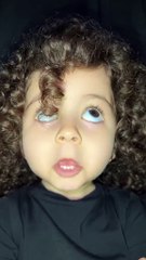 Curly-Haired Cuteness: Watch This Stylish Baby's Sweet Dance!