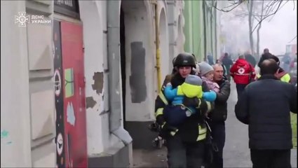 Children rushed out of Ukraine kindergarten hit in large-scale Russian attack