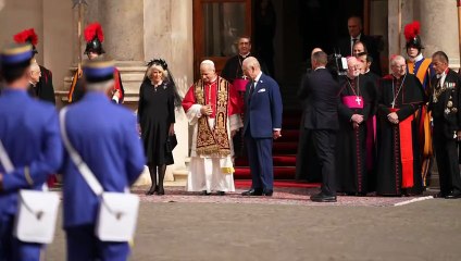 King and Pope Leo depart Sistine Chapel following service