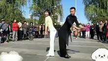 A man and woman were dancining