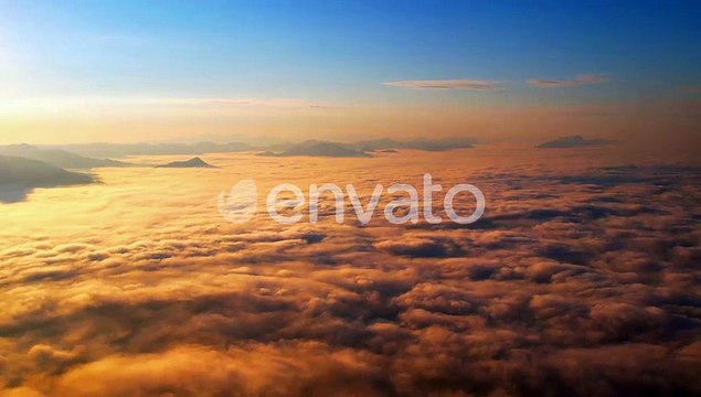4K Sun is rising above sea of clouds until the horizon5