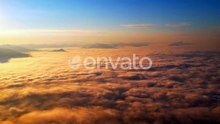 4K Sun is rising above sea of clouds until the horizon5