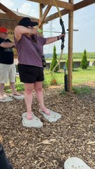 🏹 Barefoot precision in the archery hut