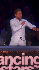 Derek Hough Accidentally Rips Off Mic Pack To Give Feedback On 'DWTS'