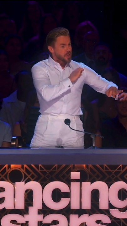 Derek Hough Accidentally Rips Off Mic Pack To Give Feedback On 'DWTS'