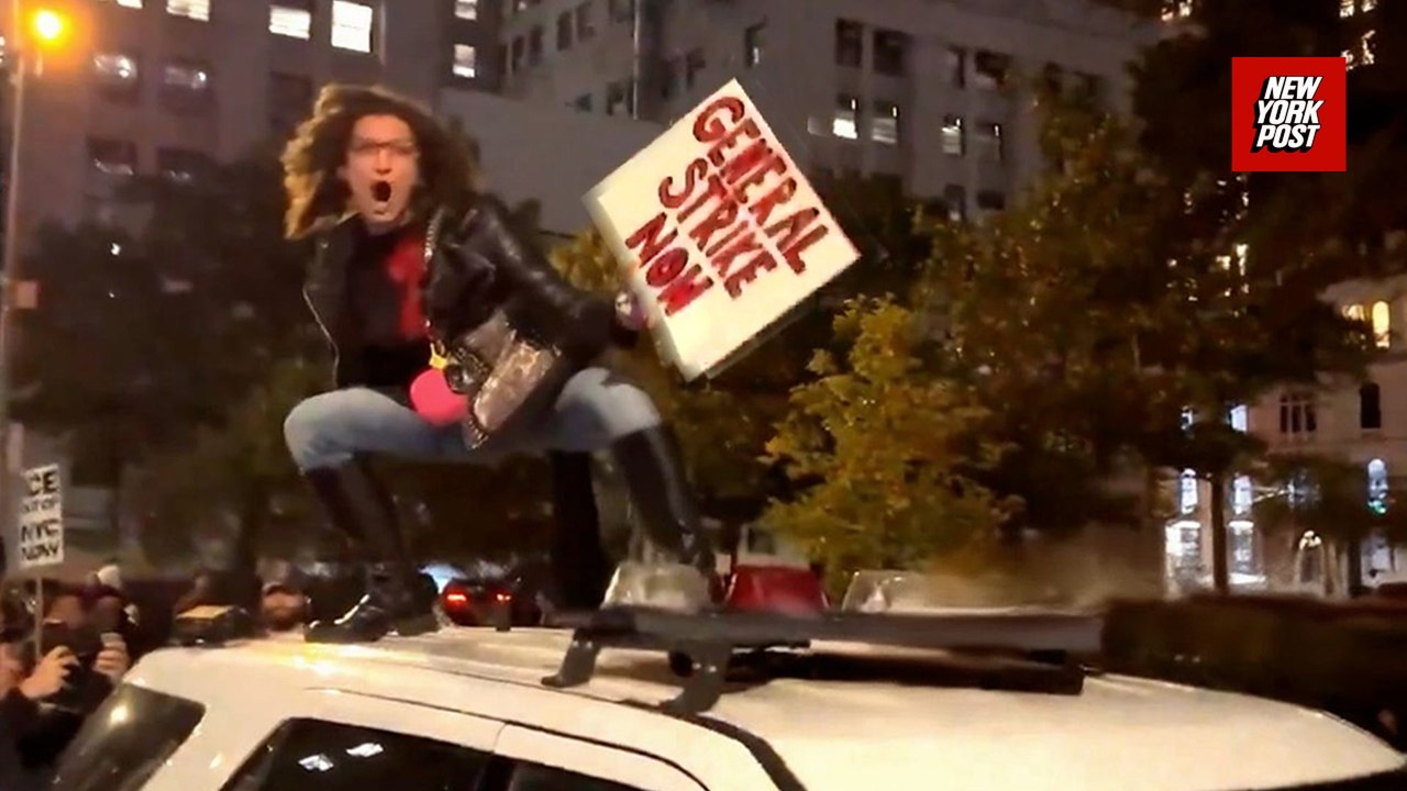 NYC protester jumps on cop car as anti-ICE demonstrators take to the streets