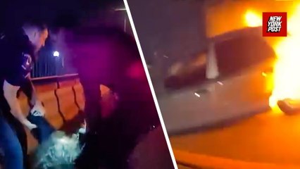 Hero cop rescues woman from burning car after late-night highway crash