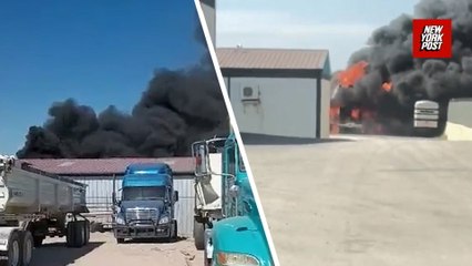 Fiery explosion leaves two dead after plane crashes into 18-wheeler near a Texas airfield