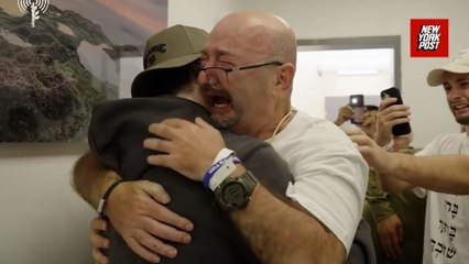 Israeli hostages freed: Father stands from wheelchair to embrace Bar Kuperstein