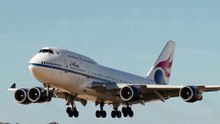 Boeing 747 landing on a sandy runway