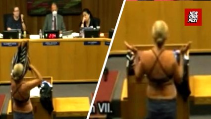 Woman strips to bikini at California school board meeting to protest transgender locker room policy