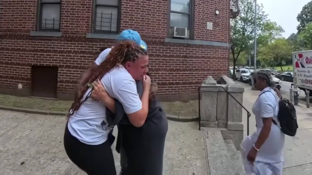 Mother of 14-year-old comforted by neighbors after 14-year-old son is fatally stabbed